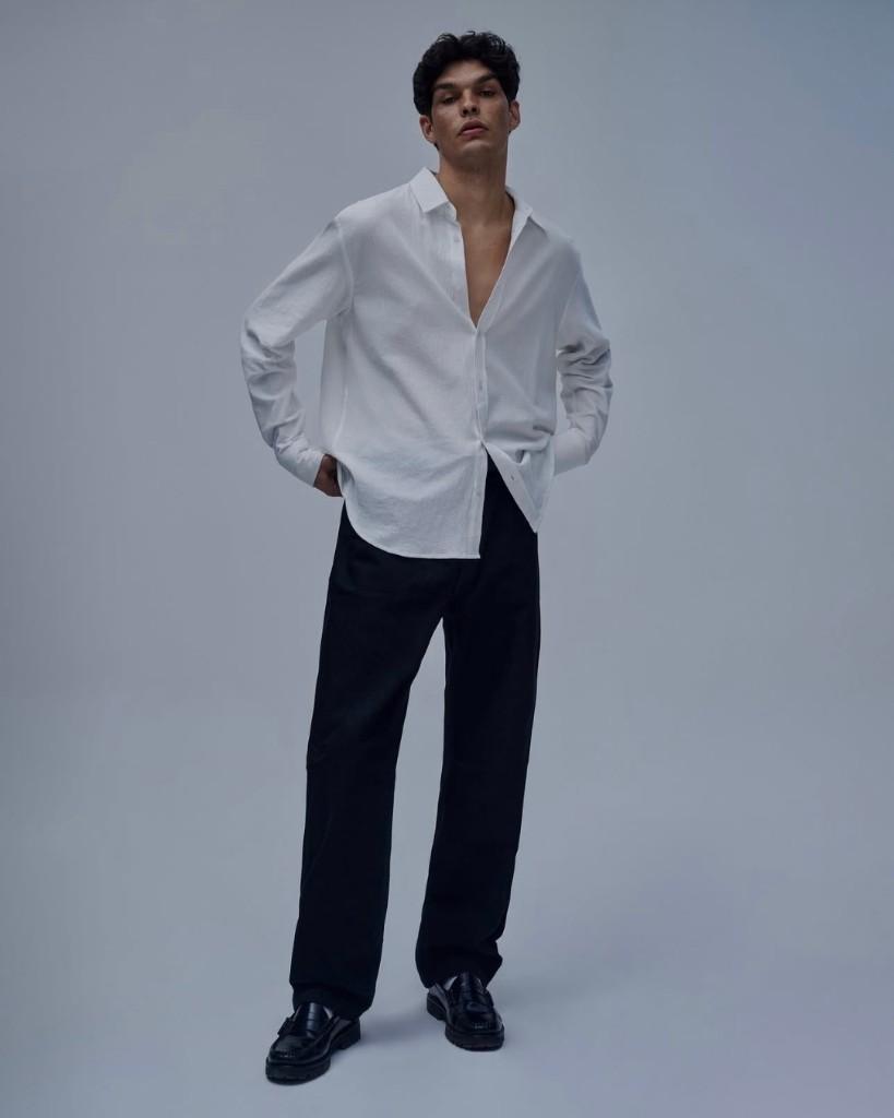 Editorial portrait in minimalist studio setting